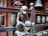 Kathmandu Patan Golden Temple 20 Statue Of A Monkey Holding A Jackfruit 